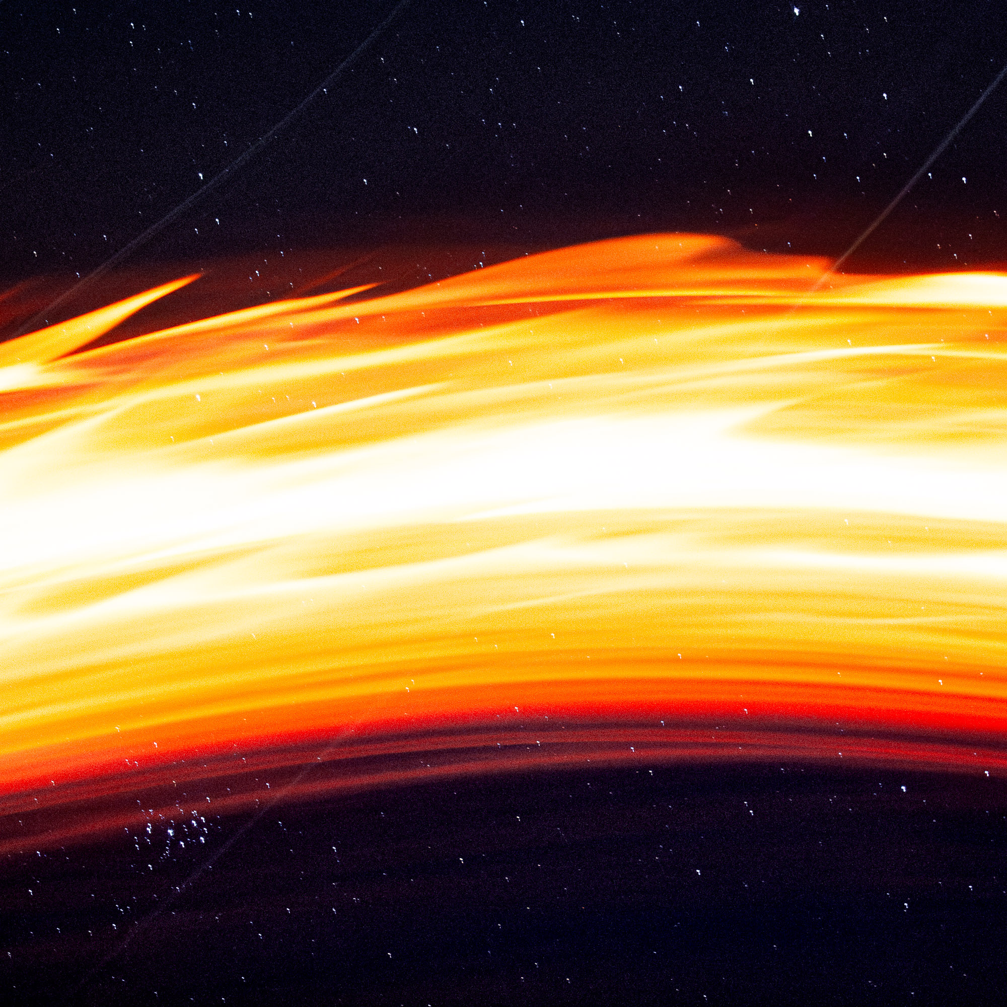 Fire Among The Stars - An Artistic Photo By Judah Inman
